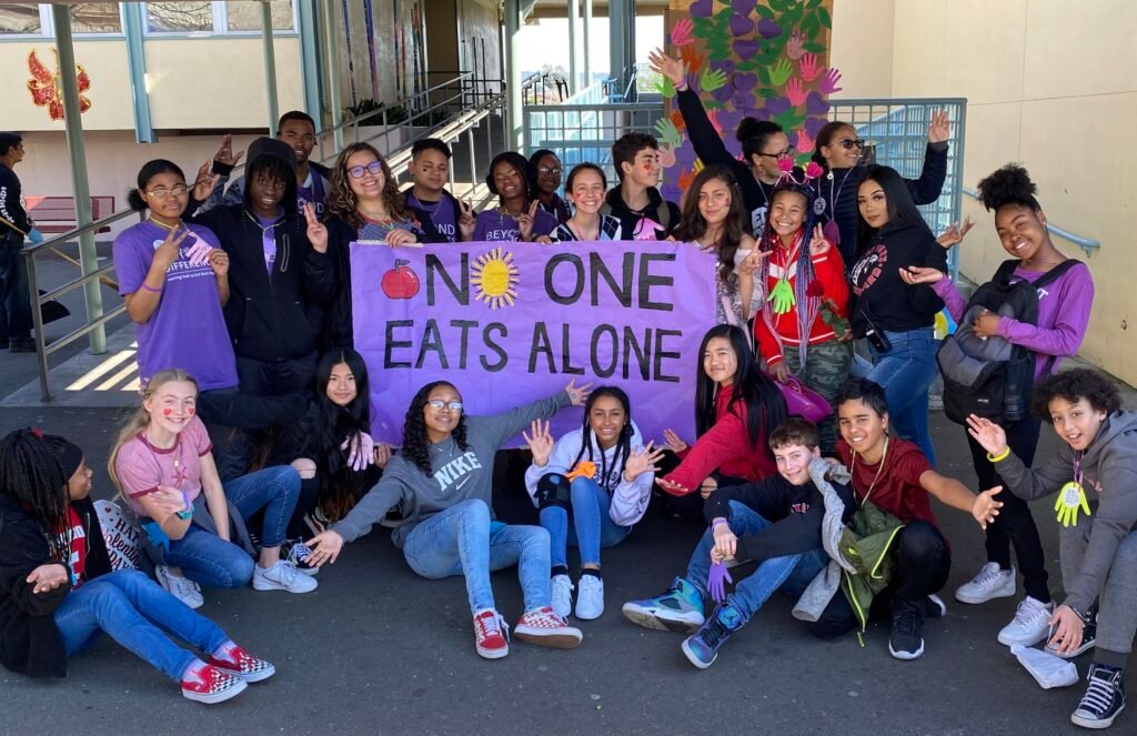 You are currently viewing Inside No One Eats Alone Day and the Nonprofit Working to End Social Isolation in Middle Schools