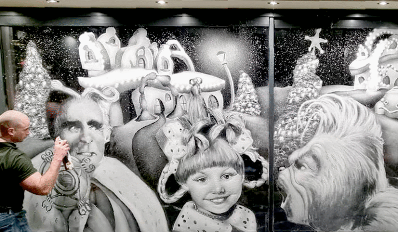 Read more about the article Meet Snow Graffiti Scott: Artist Creates Stunning Window Displays Inspired by Holiday Movies — Exclusive